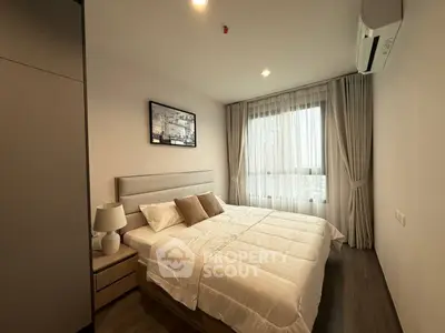Cozy modern bedroom with elegant decor and natural light