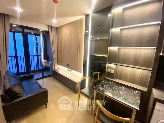 Modern living room with sleek design and balcony view