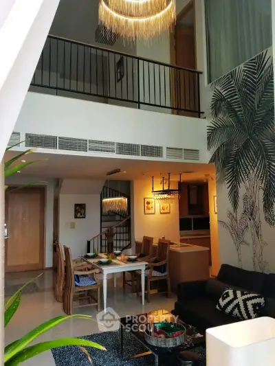 Stunning duplex living room with modern decor and open kitchen layout