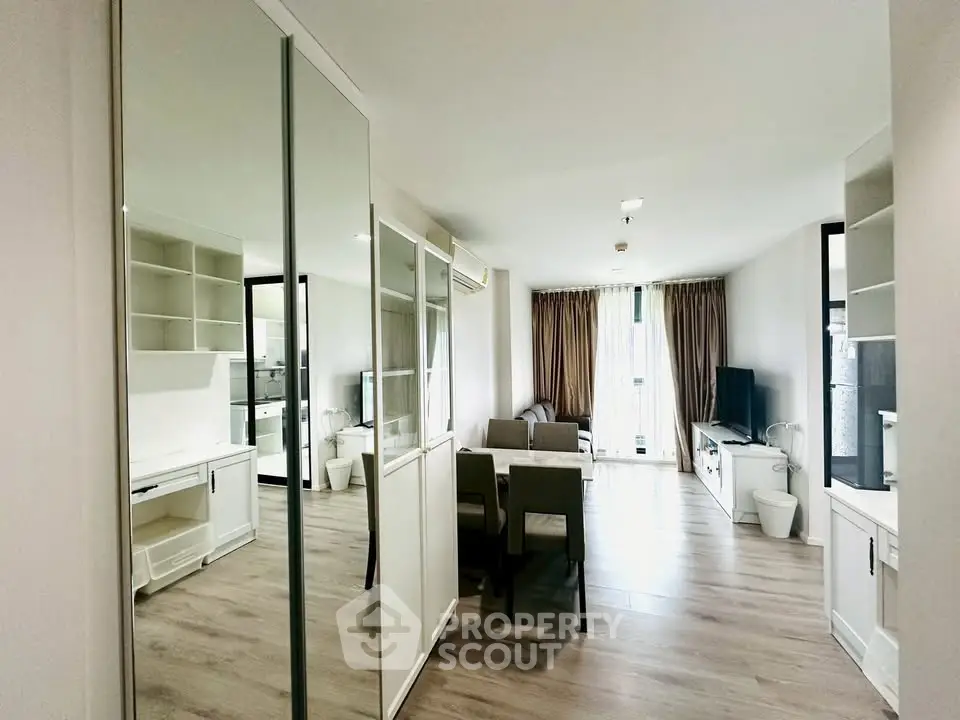 Spacious modern living room with elegant decor and natural light