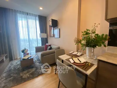 Modern living room with cozy seating and elegant dining area, featuring floor-to-ceiling windows and stylish decor.