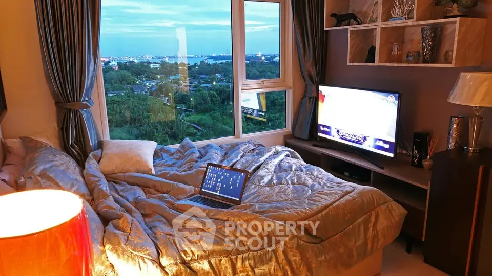 Luxurious bedroom with stunning city view and modern decor