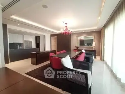 Luxurious modern living room with elegant decor and open kitchen layout
