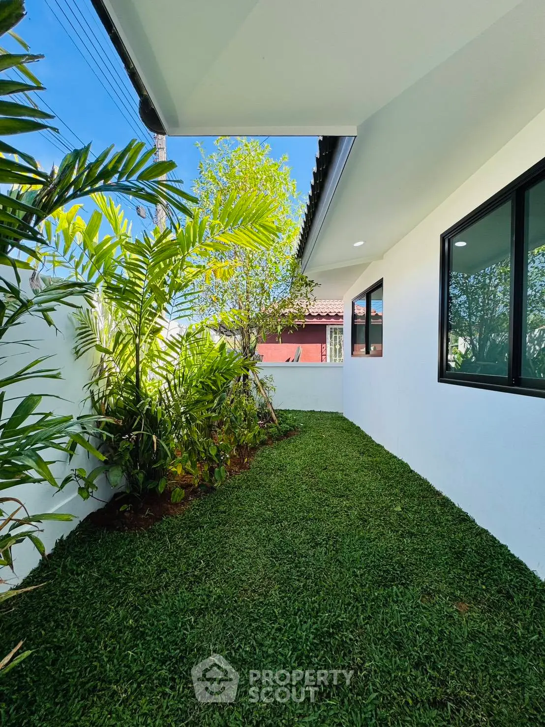 Charming garden area with lush greenery and modern exterior design