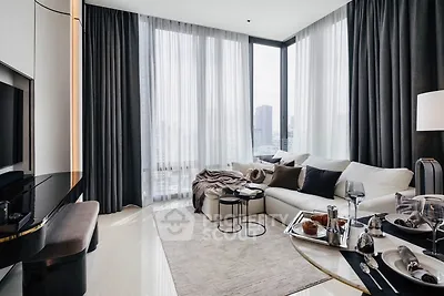 Luxurious modern living room with floor-to-ceiling windows and elegant decor
