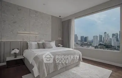 Luxurious bedroom with stunning city view and elegant decor