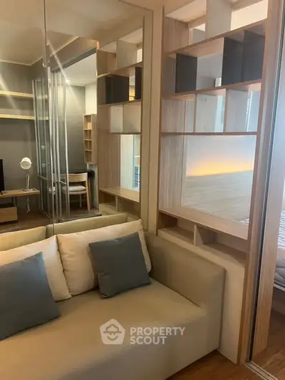 Modern living room with stylish shelving and cozy seating area