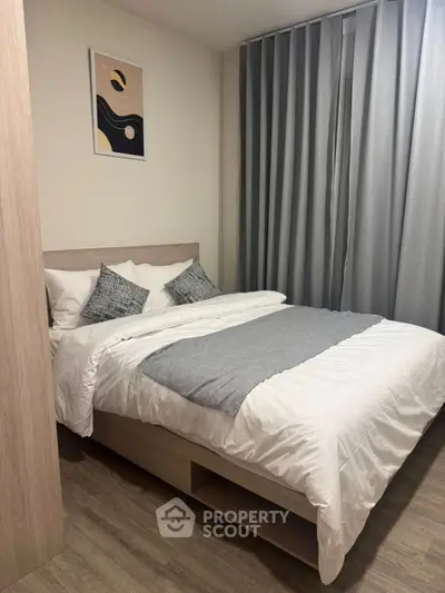 Cozy modern bedroom with stylish decor and natural light