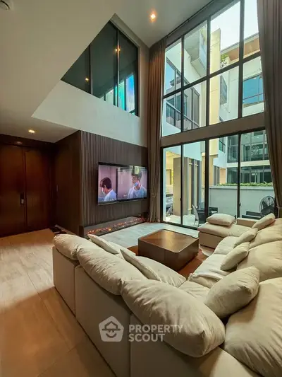 Luxurious living room with high ceilings and modern design