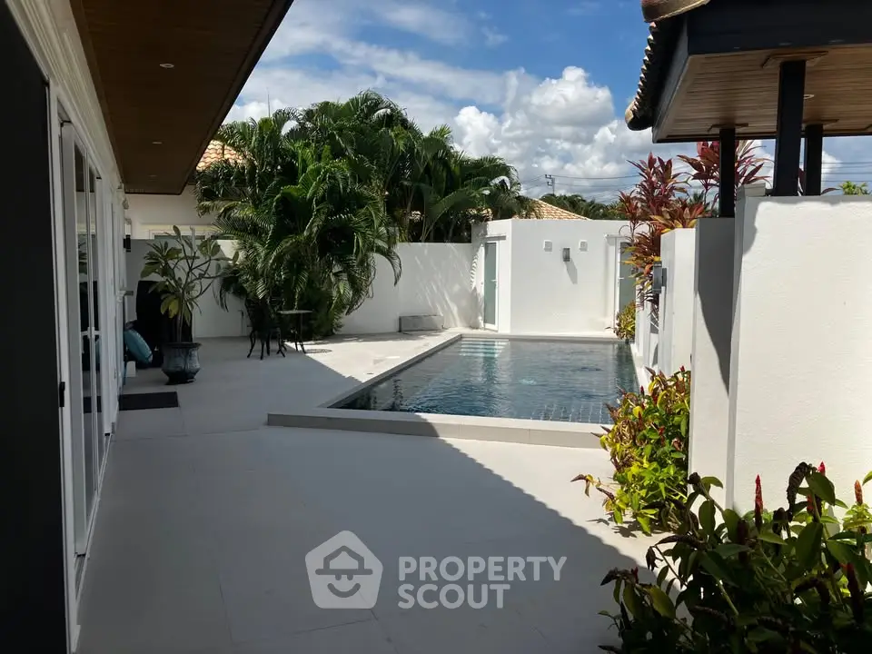 Luxurious villa with private pool and lush garden, perfect for relaxation and entertaining.