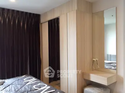 Modern bedroom with stylish wooden wardrobe and elegant decor