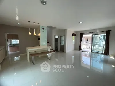Spacious modern living room with open layout and natural light