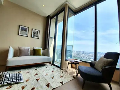 Stunning living room with panoramic city view and modern decor