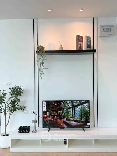 Modern living room with sleek TV setup and stylish decor