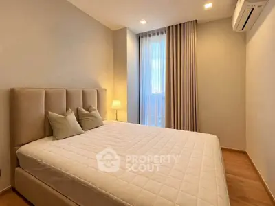 Modern bedroom with elegant decor and natural light