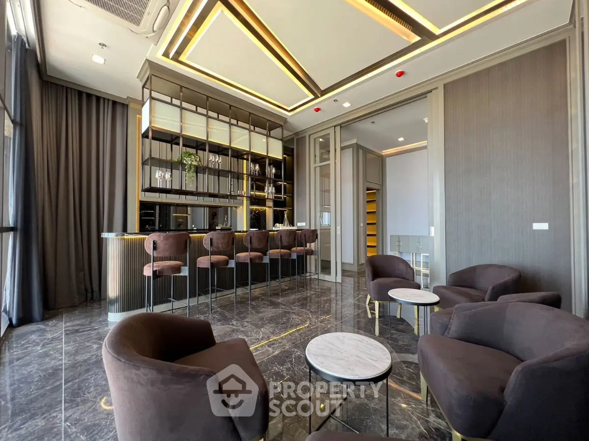 Luxurious modern living room with elegant seating and stylish lighting