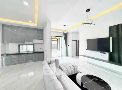 Modern living room with sleek design, open layout, and stylish furniture in a bright, spacious setting.
