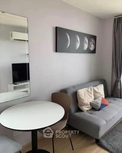 Modern living room with stylish decor and cozy seating area