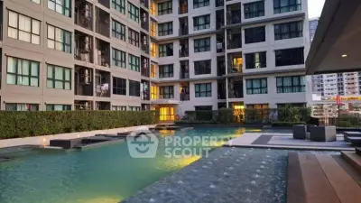 Luxurious apartment complex with stunning pool and modern architecture