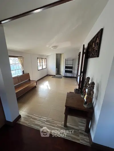 Spacious interior with natural light and decorative elements