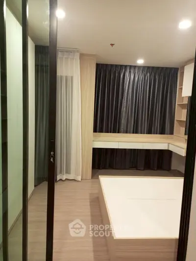 Modern bedroom with sleek design and built-in storage solutions