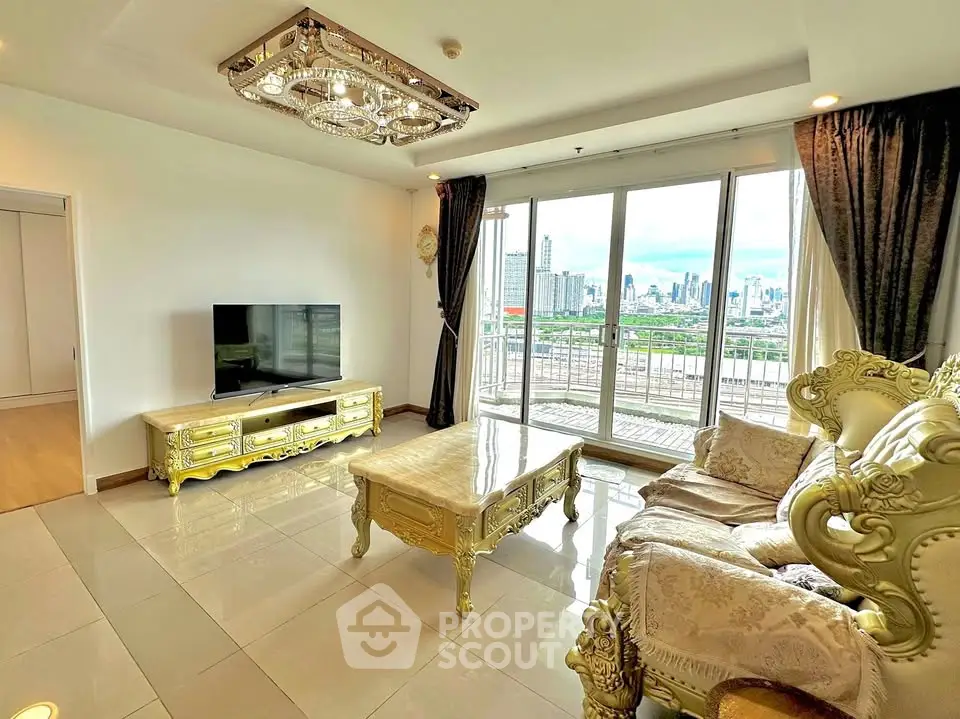 Luxurious living room with ornate furniture and city view balcony