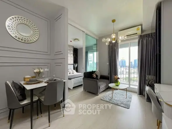 Modern open-plan living room with dining area and city view balcony in stylish apartment.