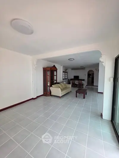 Spacious living room with elegant furniture and open layout