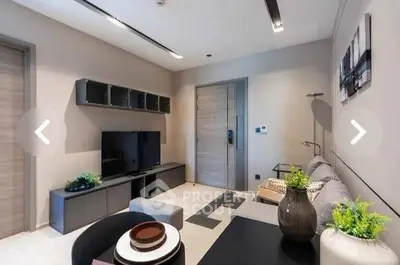 Modern living room with sleek furniture and stylish decor