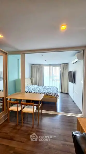 Modern studio apartment with open layout and stylish furnishings
