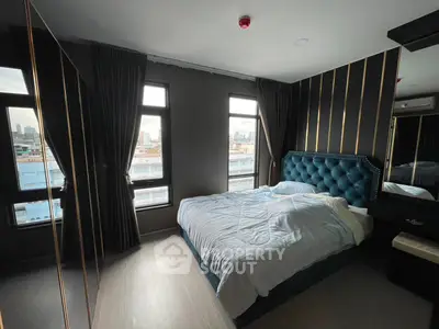 Luxurious bedroom with city view and elegant decor