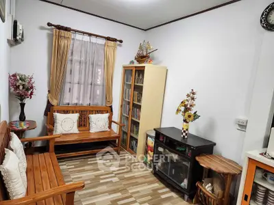 Cozy living room with wooden furniture and decorative accents