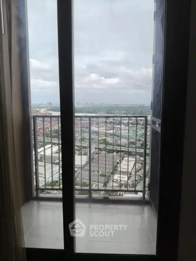 Stunning high-rise balcony view showcasing expansive cityscape and skyline, perfect for urban living enthusiasts.