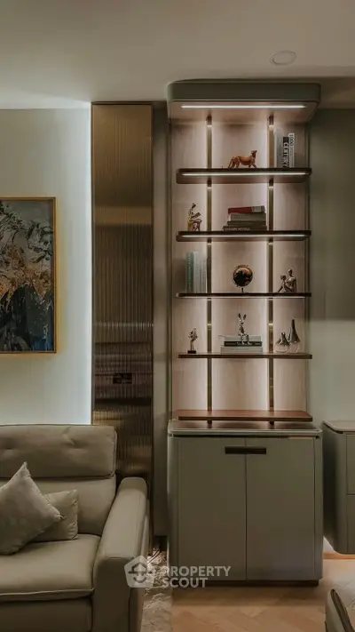 Elegant living room with modern shelving and cozy seating area