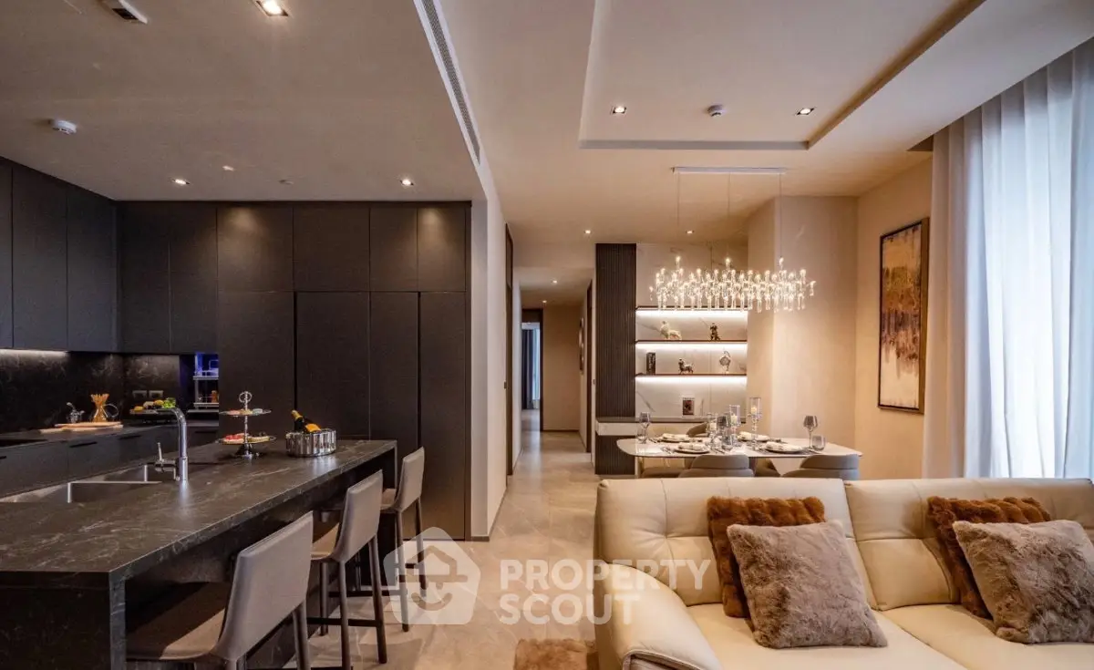 Luxurious modern living room with open kitchen and elegant dining area, featuring plush seating and stylish lighting.