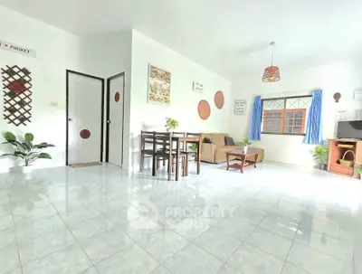 Bright and airy living room with modern decor and ample natural light.