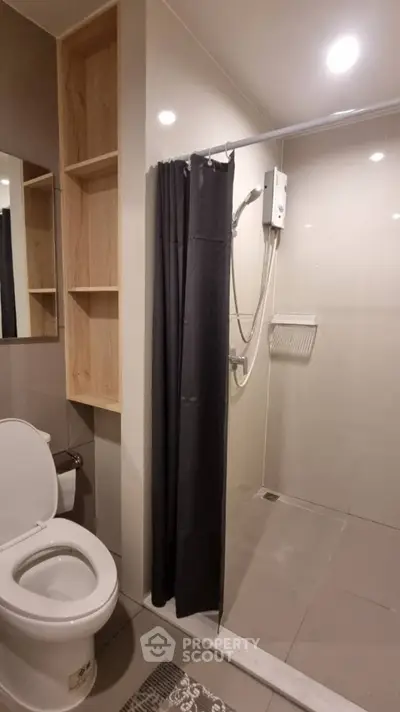 Modern bathroom with shower and toilet in sleek design