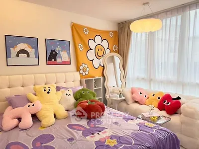 Charming bedroom with plush decor and ample natural light