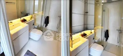 Modern bathroom with sleek design and glass shower enclosure