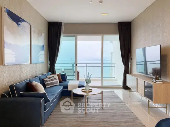 Luxurious living room with modern decor and stunning balcony view