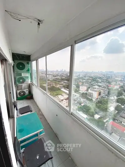 Spacious balcony with stunning city view, perfect for relaxation and enjoying the skyline.