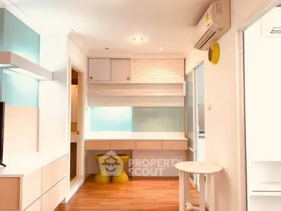 Modern living room with stylish decor and air conditioning in a bright apartment.