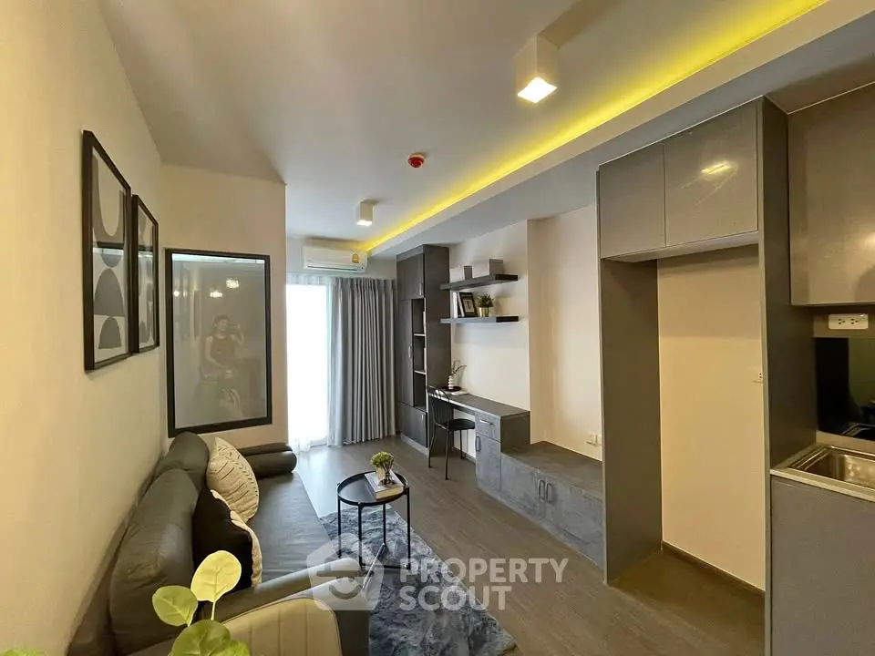 Modern living room with sleek design and cozy ambiance, featuring stylish furniture and contemporary decor.