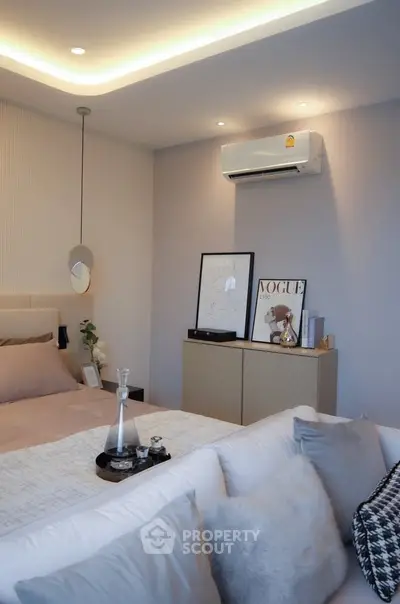 Luxurious modern bedroom with elegant decor and ambient lighting