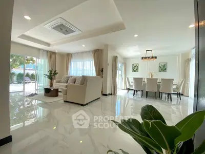 Spacious modern living and dining area with elegant decor and natural light