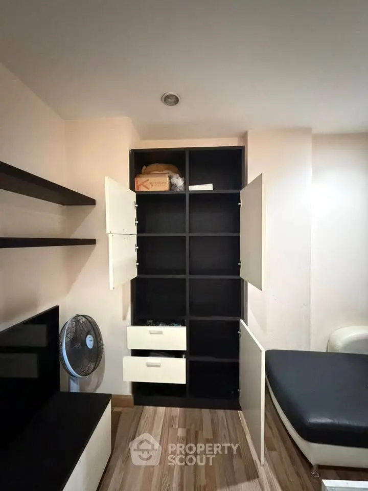 Modern apartment interior with sleek storage solutions and stylish decor