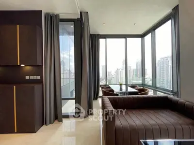 Luxurious corner unit living room with panoramic city views and modern furnishings.