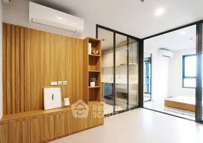 Modern apartment interior with wooden accents and glass partitions