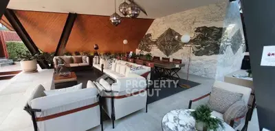 Luxurious modern living room with elegant decor and unique architectural design, perfect for sophisticated gatherings.