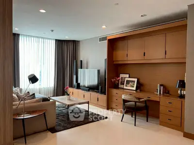 Modern living room with stylish furniture and built-in wooden cabinetry, perfect for urban living.